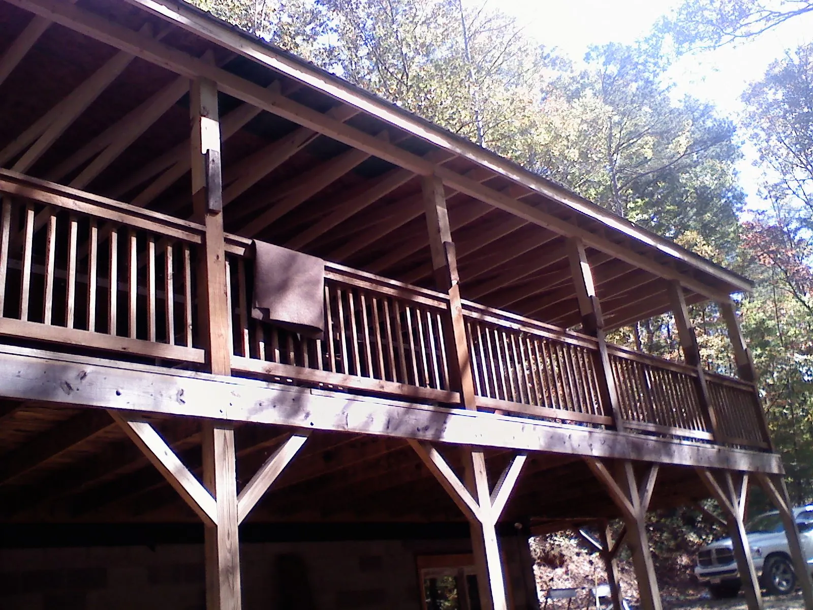 Timber framing under a new elevated porch and deck — Roof Leak Repair in Canova by Roofing Brothers